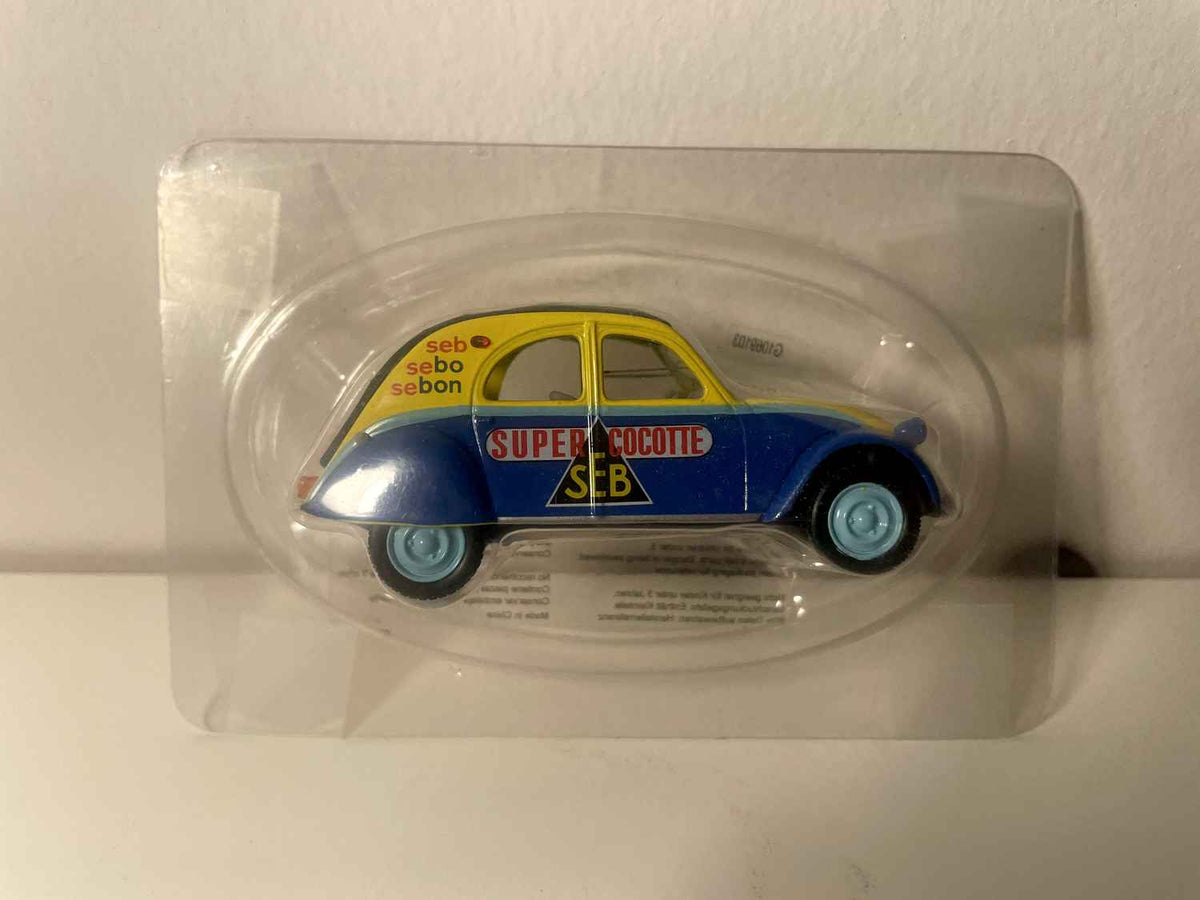 Citroën 2 CV AZL jaune et bleue avec publicité SEB (super cocotte) - Norev (sous blister)
