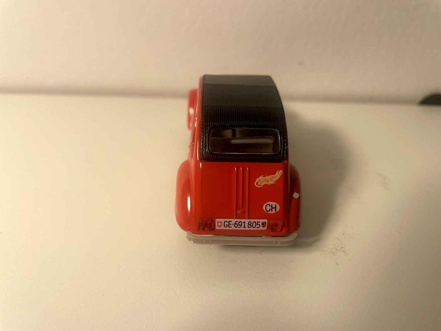 Citroën 2 CV 6 czerwony pomarańczowy z rysunkiem płomieni - Norev
