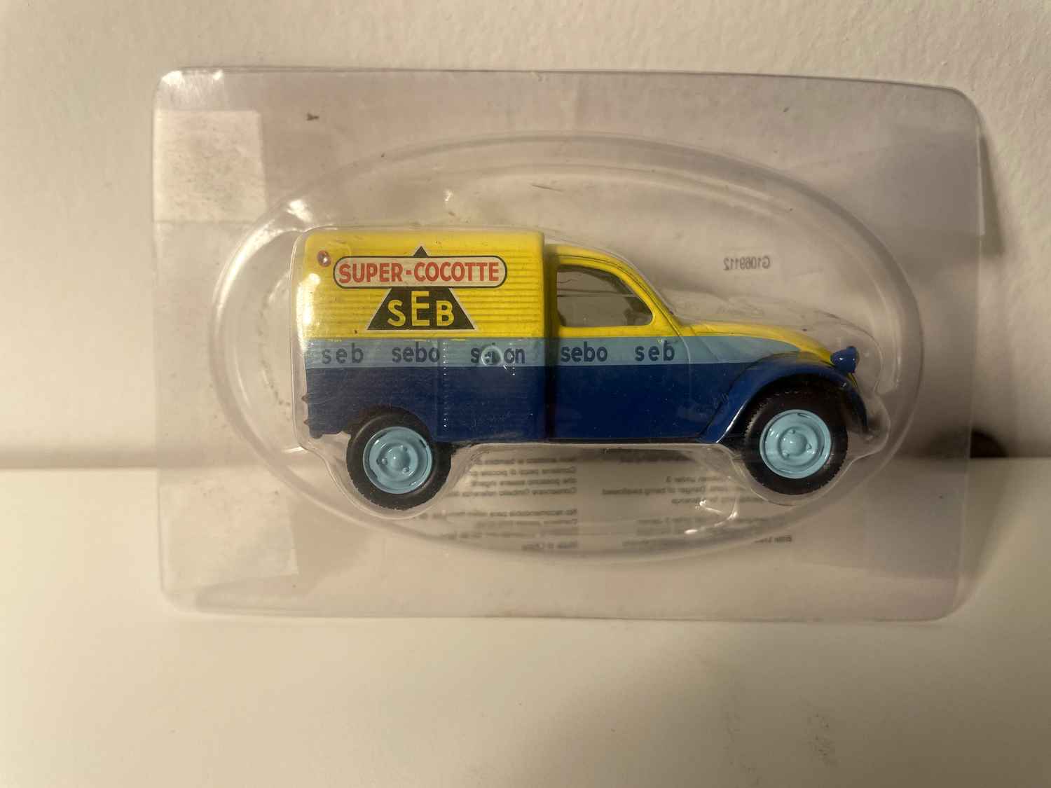 Citroën 2 CV AZU blaue und gelbe Lieferwagen mit Werbung SEB (super cocotte) - Norev