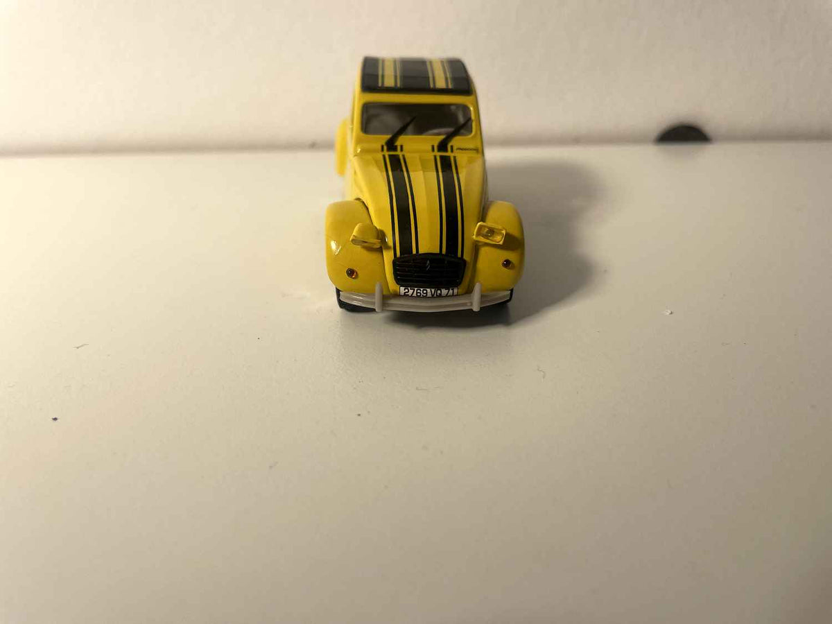 Citroën 2 CV 6 jaune avec rayures noires - Norev (sous blister) (ATTENTION: les phares avants sont de travers)