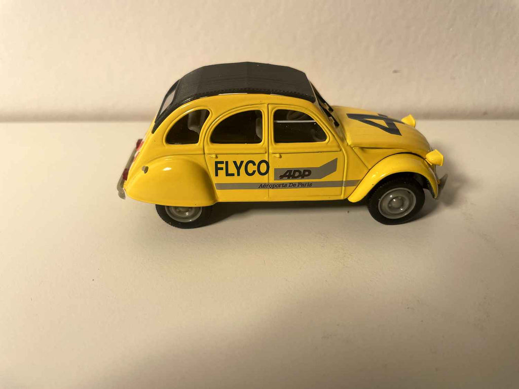 Citroën 2 CV 6 yellow and black roof FLYCO ADP - Paris Airports - Norev
