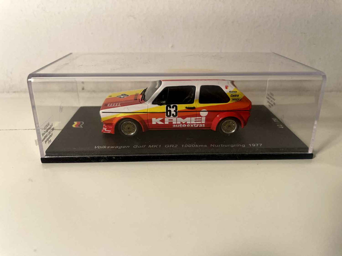 Volkswagen Golf MKI GR2 amarillo, naranja y rojo número 63 - 1000 km de Nurburgring (Alemania) de 1977 - SPARK