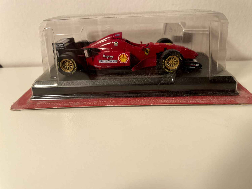 Ferrari F310 rouge numéro 1 de 1996 - formule 1 - Michael Schumacher