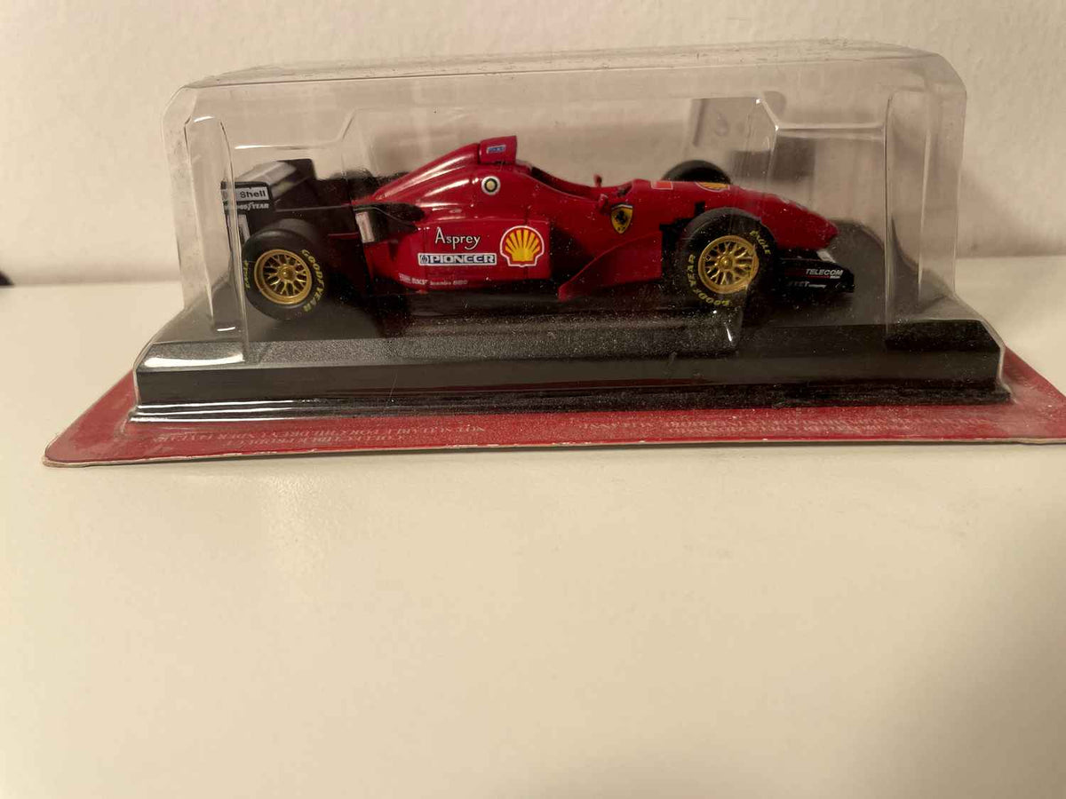 Ferrari F310 rouge numéro 1 de 1996 - formule 1 - Michael Schumacher