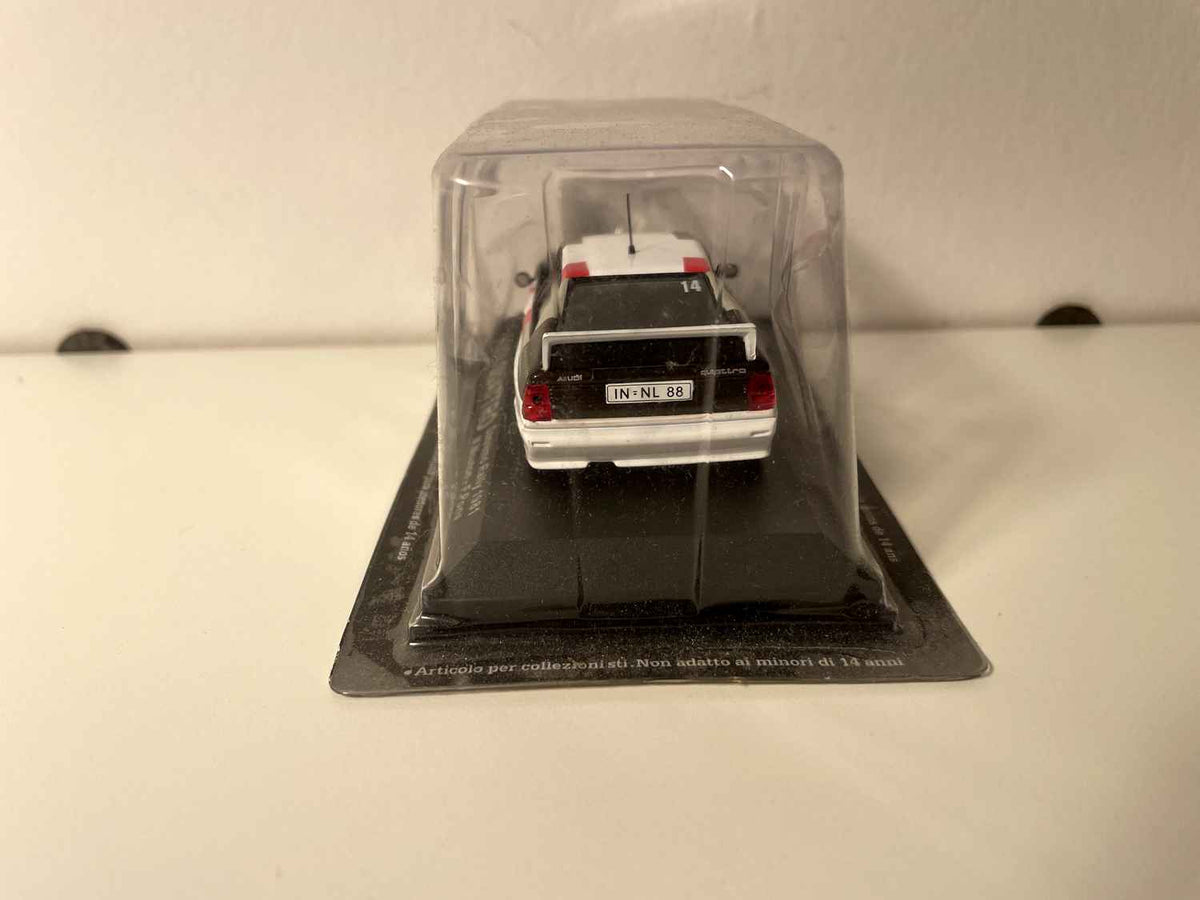 Audi Quattro blanche, noire et rouge numéro 14 - Rallye de San-Rémo de 1981 (sous blister)