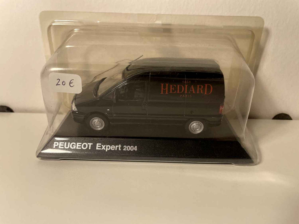 Peugeot Expert negro de 2004 con publicidad HEDIARD