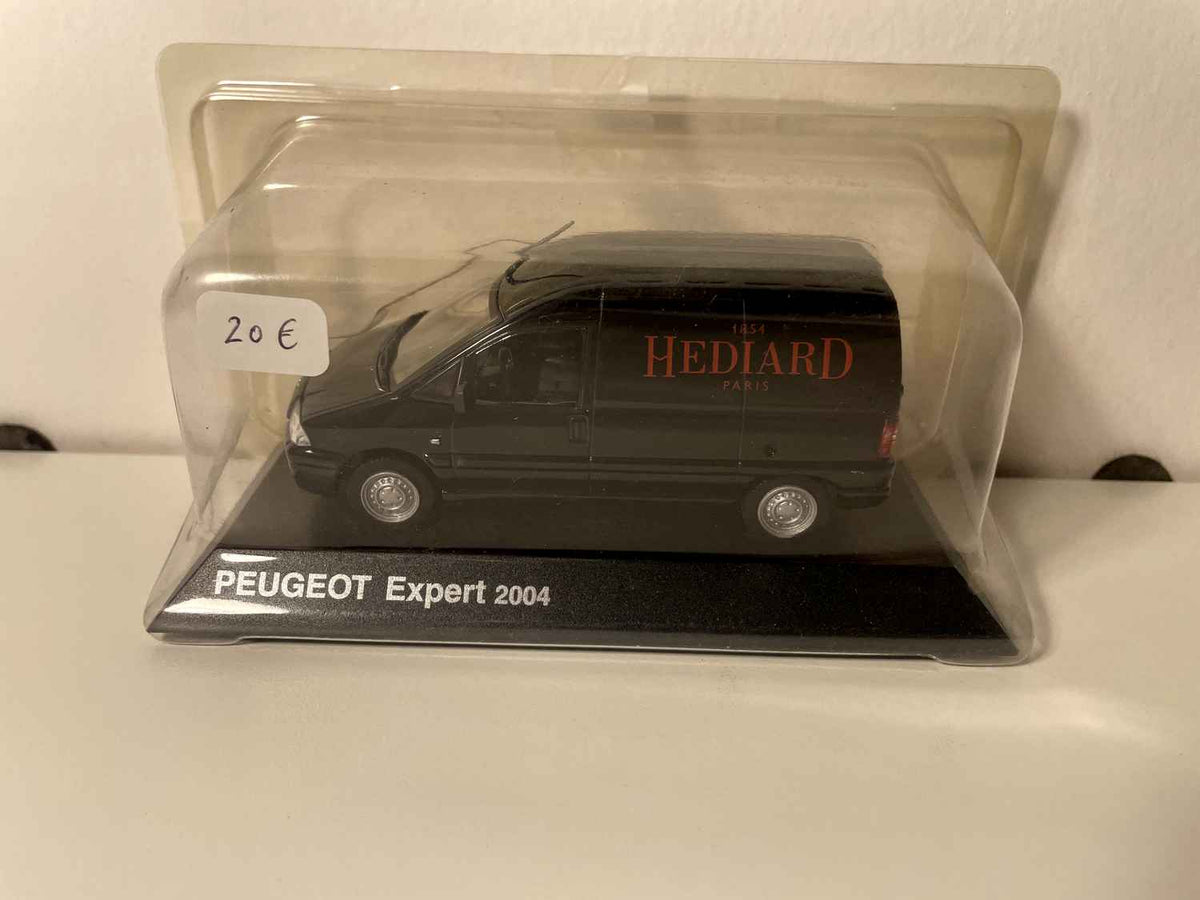 Peugeot Expert negro de 2004 con publicidad HEDIARD