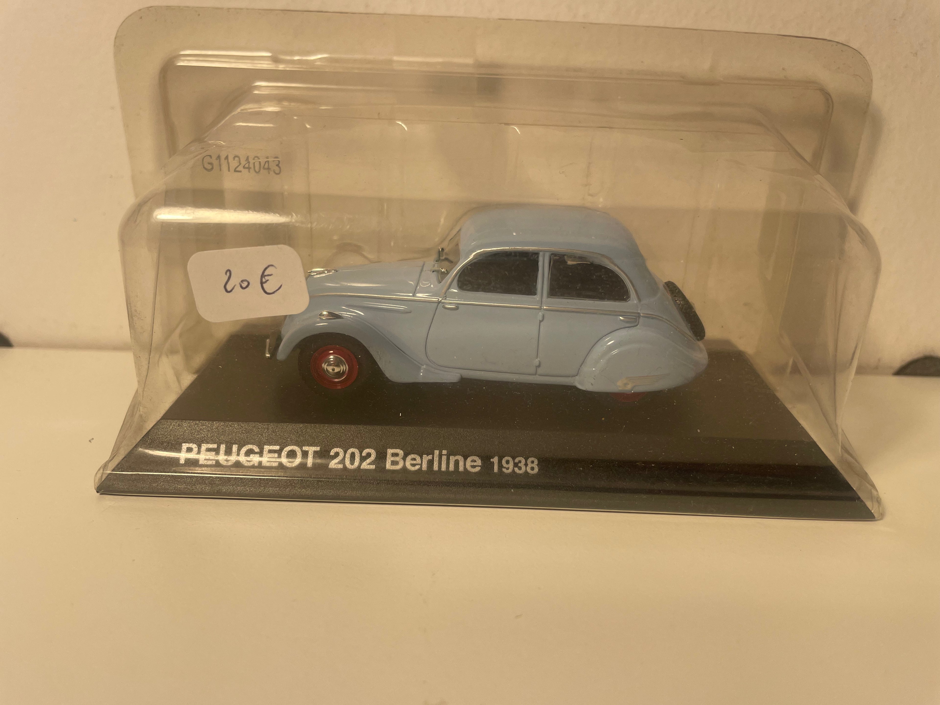 Peugeot 202 sedán azul de 1938