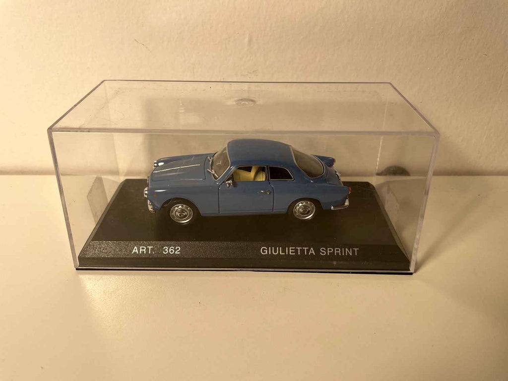 Alfa Romeo Sprint coupe niebieska z 1960 roku (kolekcja Détailcars)
