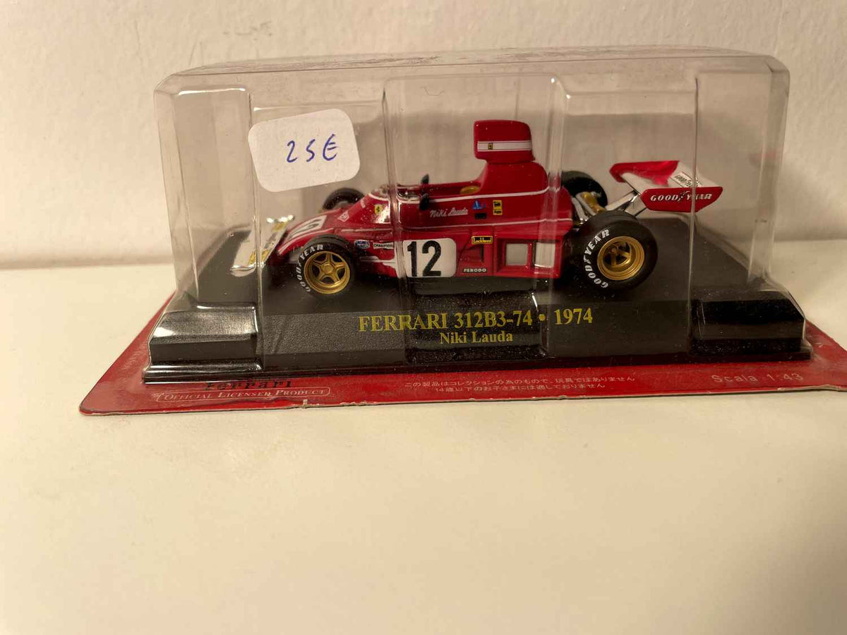 Ferrari 312B3-74 rouge numéro 12 de 1974 - Formule 1 - Niki Lauda (blister)