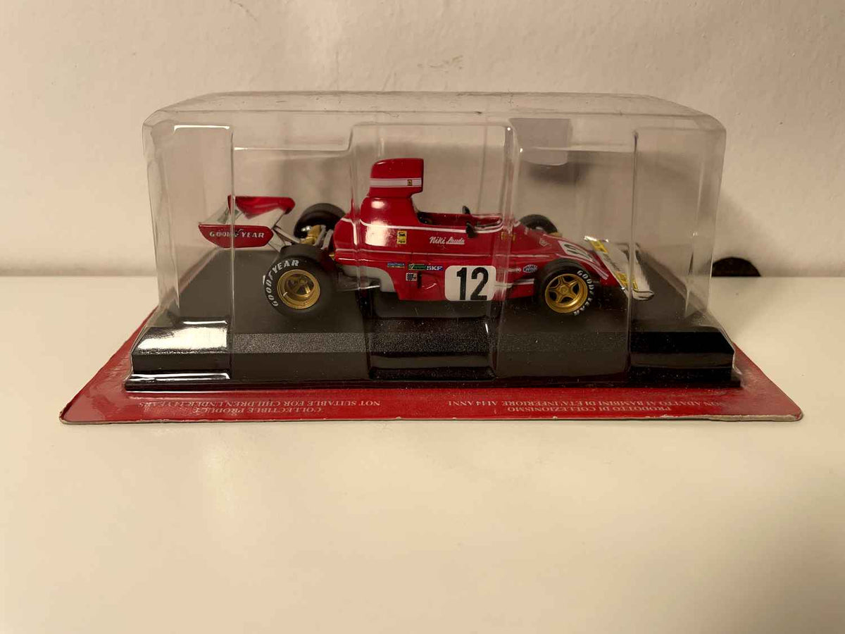 Ferrari 312B3-74 rouge numéro 12 de 1974 - Formule 1 - Niki Lauda (blister)