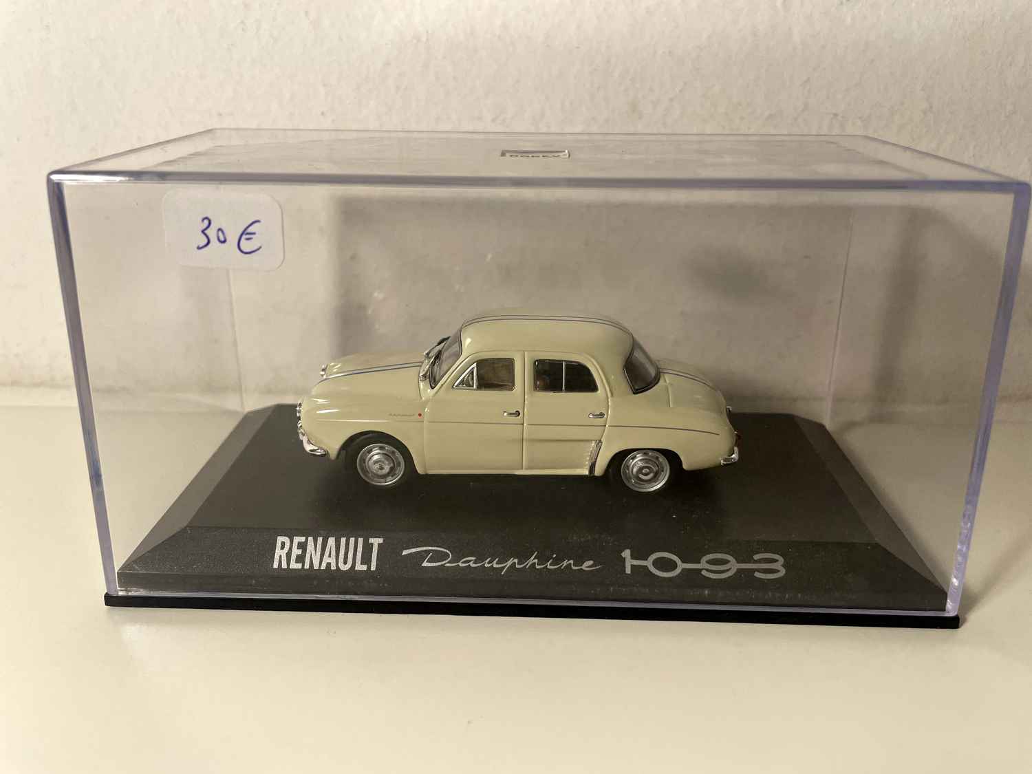 Renault Dauphine 1093 w kolorze jasnego białego z niebieskimi paskami - NOREV