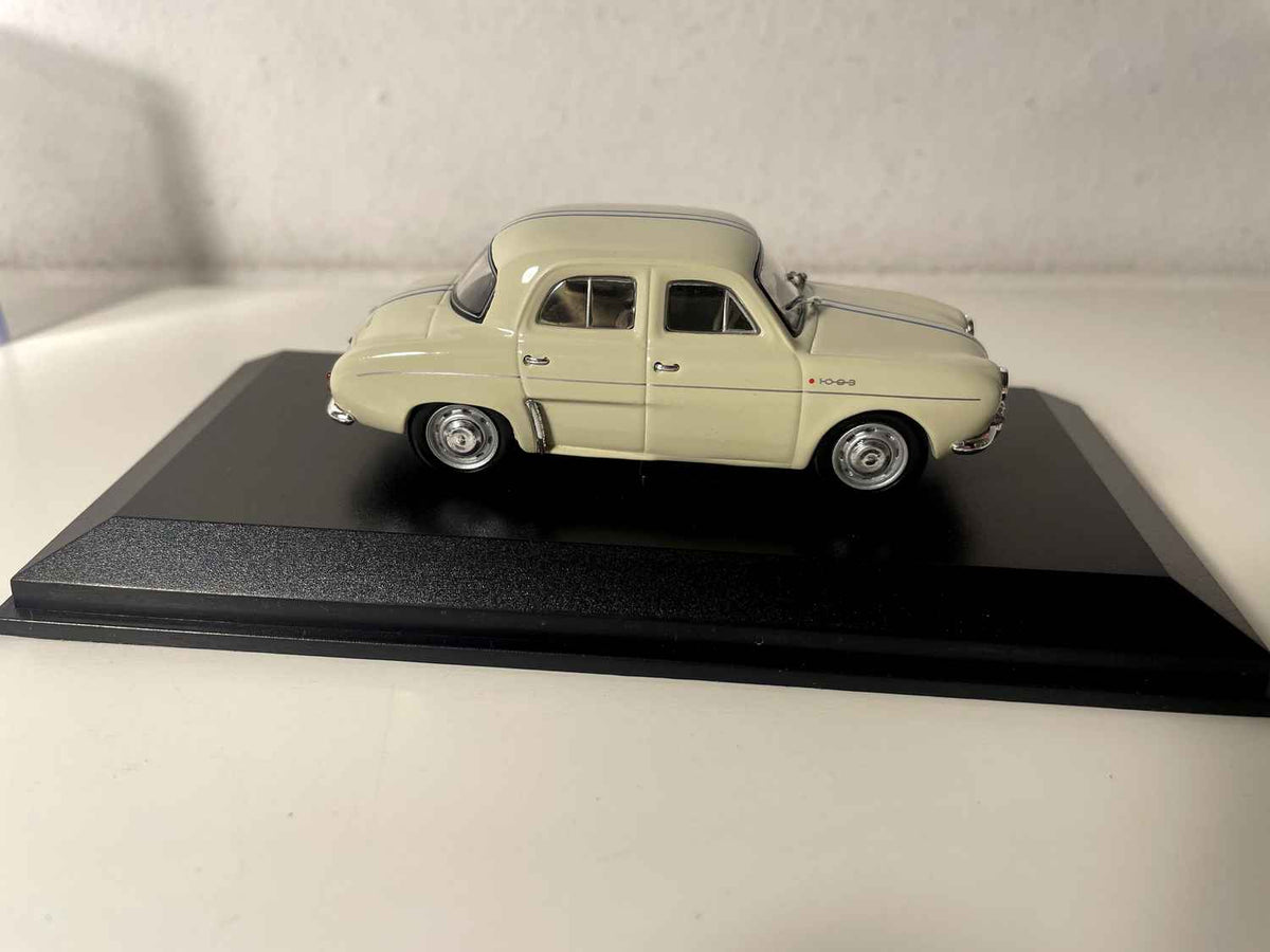 Renault Dauphine 1093 w kolorze jasnego białego z niebieskimi paskami - NOREV