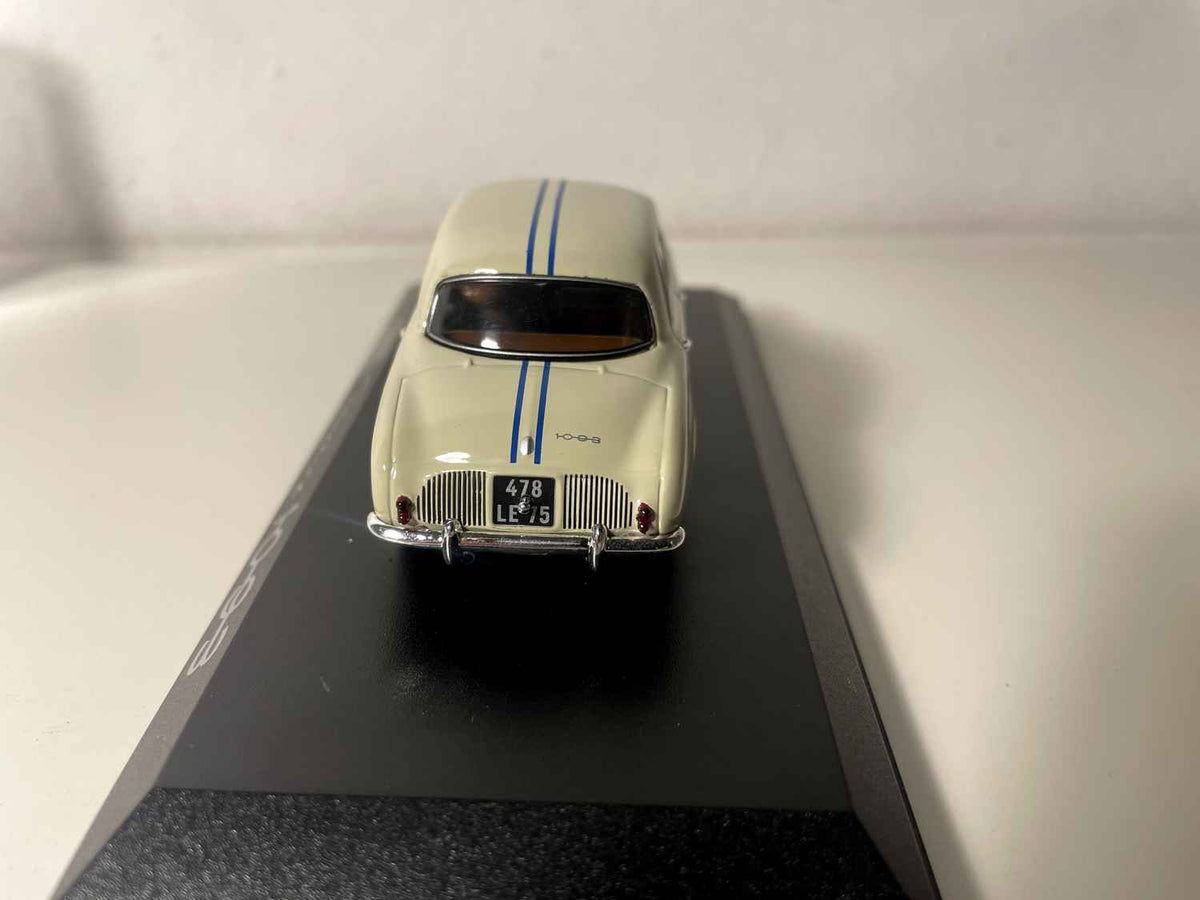 Renault Dauphine 1093 w kolorze jasnego białego z niebieskimi paskami - NOREV