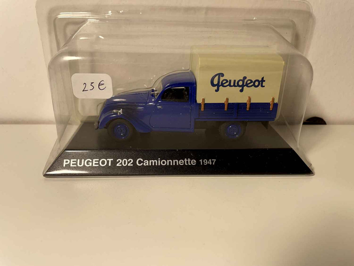 Furgoneta Peugeot 202 de lona azul de 1947 (lona beige con el texto PEUGEOT)