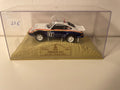 Porsche 911 blanca y azul número 176 - Paris-Dakar 1984