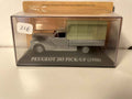 Peugeot 203 pick-up grigio con telone verde del 1950