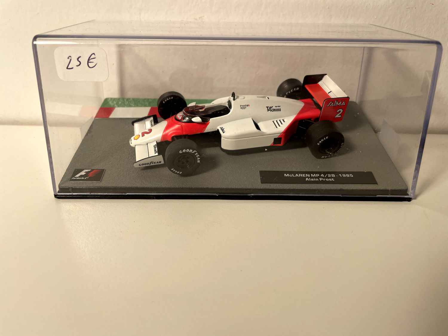 McLaren MP 4/2B white and orange number 2 from 1985 - Formula 1