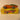 Auto de course orange et verte numéro 4 Dinky-Toys (édition Atlas) - N°23A