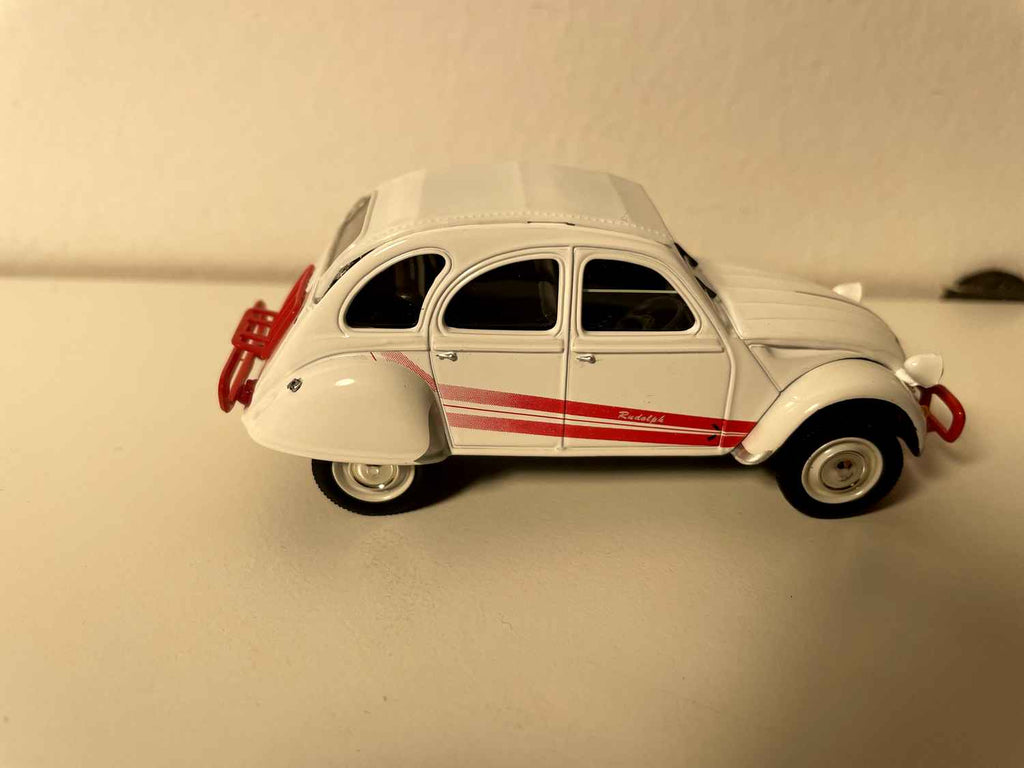 Citroën 2 CV 6 blanche et barres rouges (avec inscription "Rudolph") - Norev (sous blister)