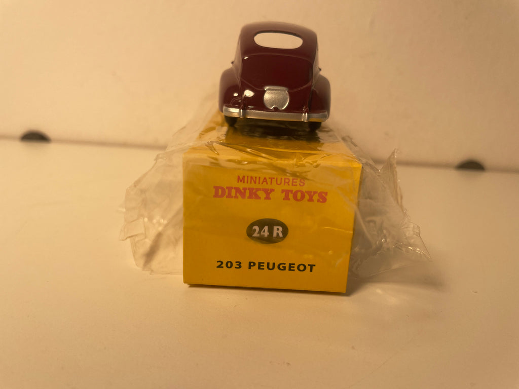 Peugeot 203 bordeaux Dinky-Toys (edycje Atlas) - N°24 R