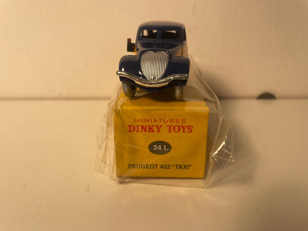 Peugeot 402 blu e arancione TAXI Dinky-Toys (edizione Atlas) - N°24 L