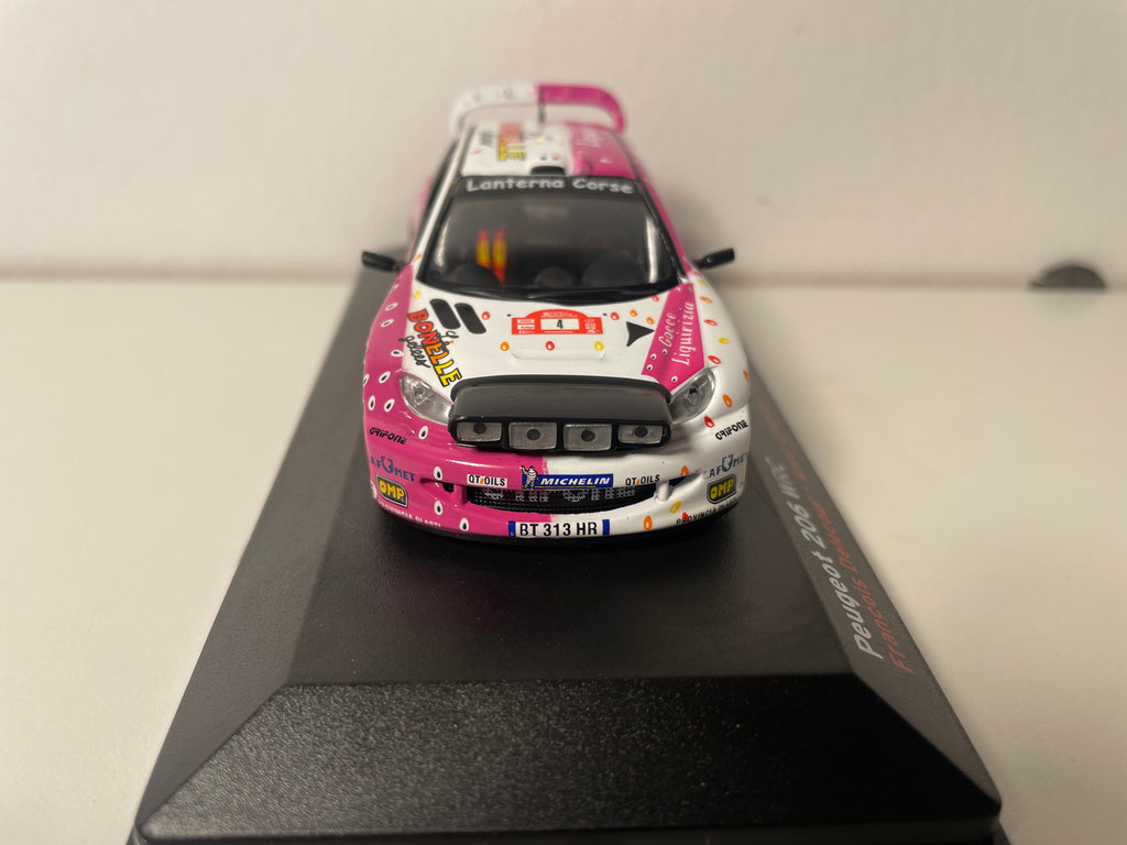 Peugeot 206 WRC wäiss a rose Nummer 4 - Rallye vu Madeira 2003