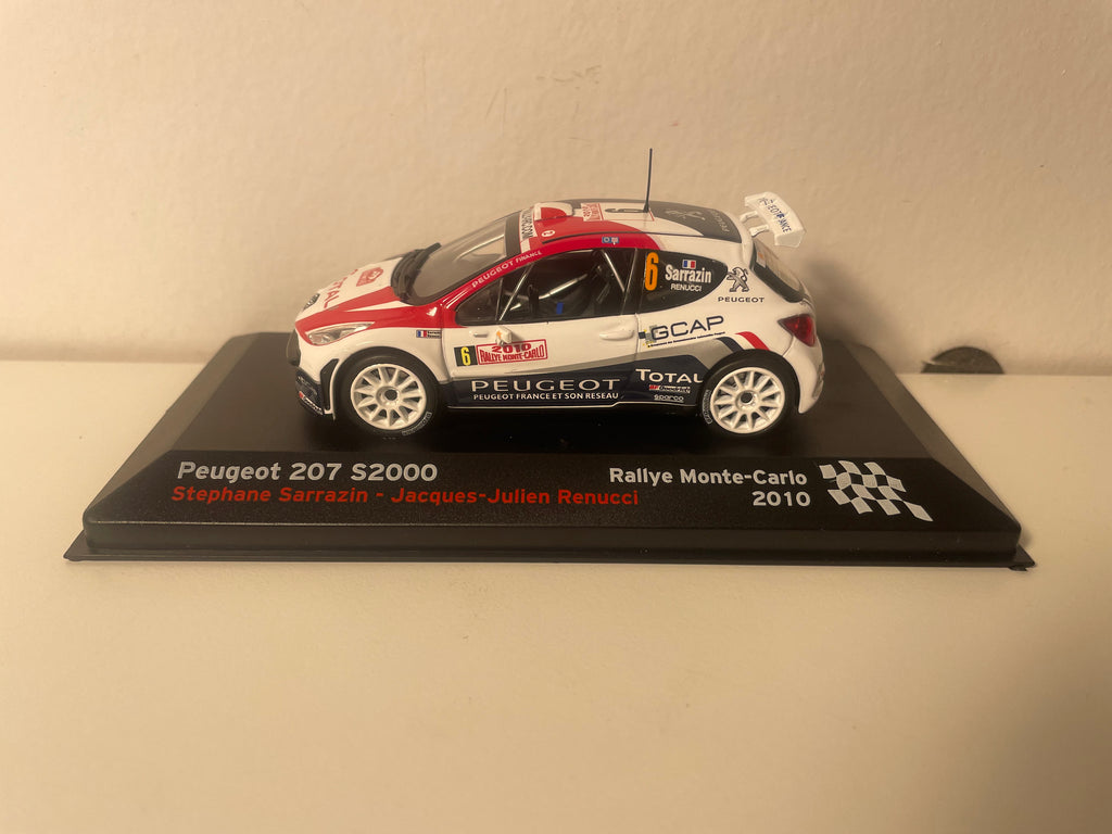 Peugeot 207 S2000 azul, blanco y rojo número 6 - Rallye de Monte-Carlo 2010