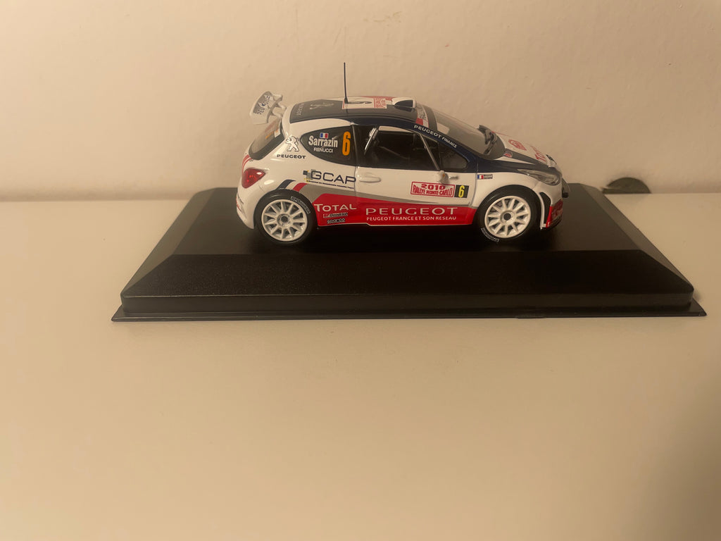 Peugeot 207 S2000 azul, blanco y rojo número 6 - Rallye de Monte-Carlo 2010