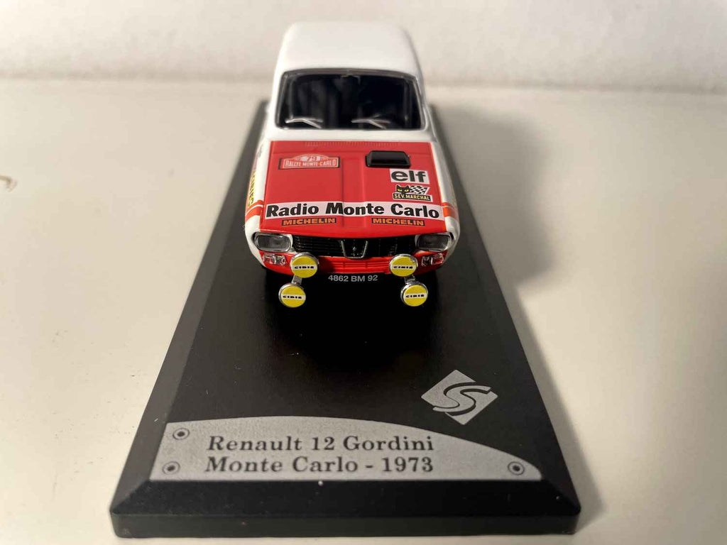 Renault 12 Gordini w białym i pomarańczowo-czerwonym kolorze numer 78 (Rallye de Monté-Carlo 1973)