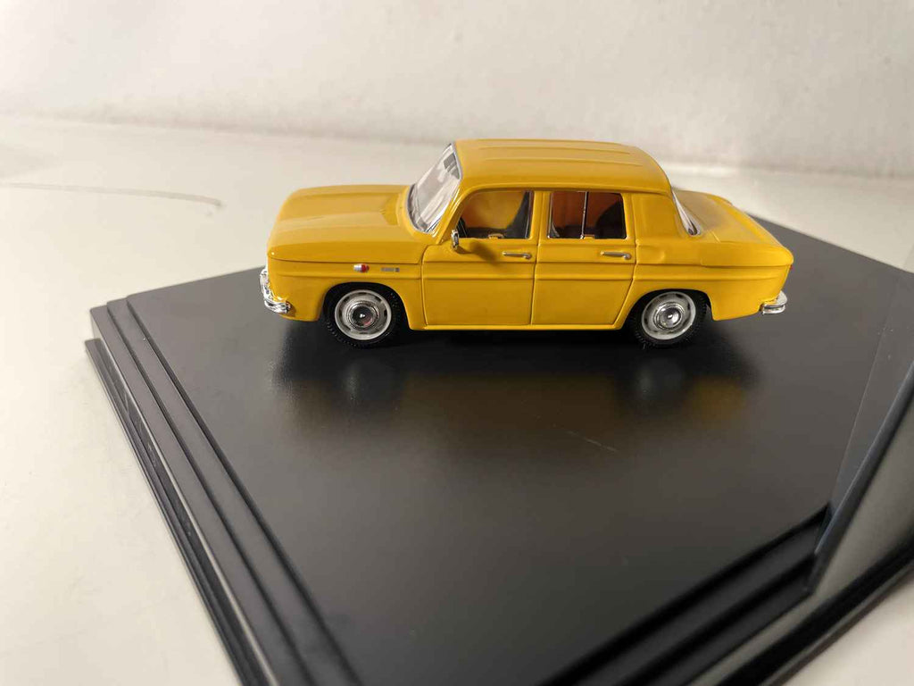 Renault 8S giel vum Joer 1969 (box mat rechteckiger Këscht) - NOREV