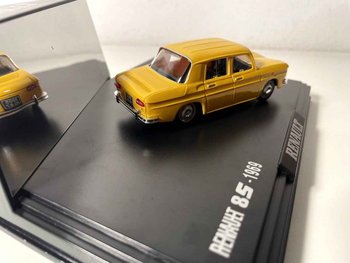 Renault 8S giel vum Joer 1969 (box mat rechteckiger Këscht) - NOREV