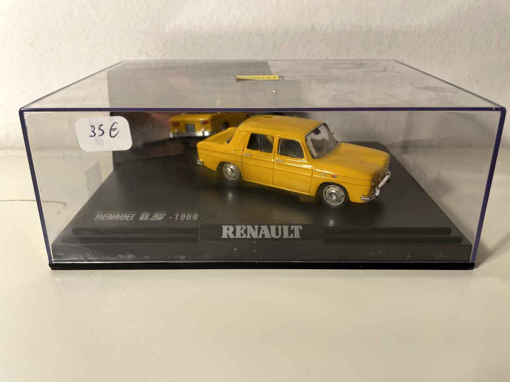 Renault 8S giel vum Joer 1969 (box mat rechteckiger Këscht) - NOREV