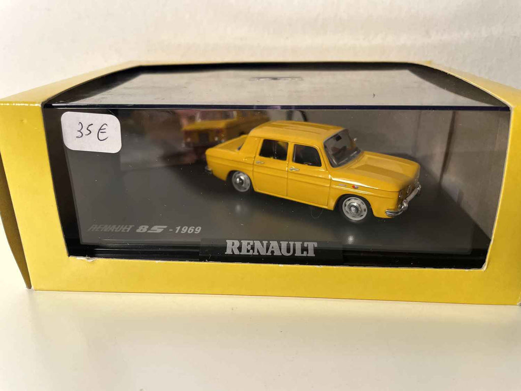 Renault 8S giel vum Joer 1969 (box mat rechteckiger Këscht) - NOREV