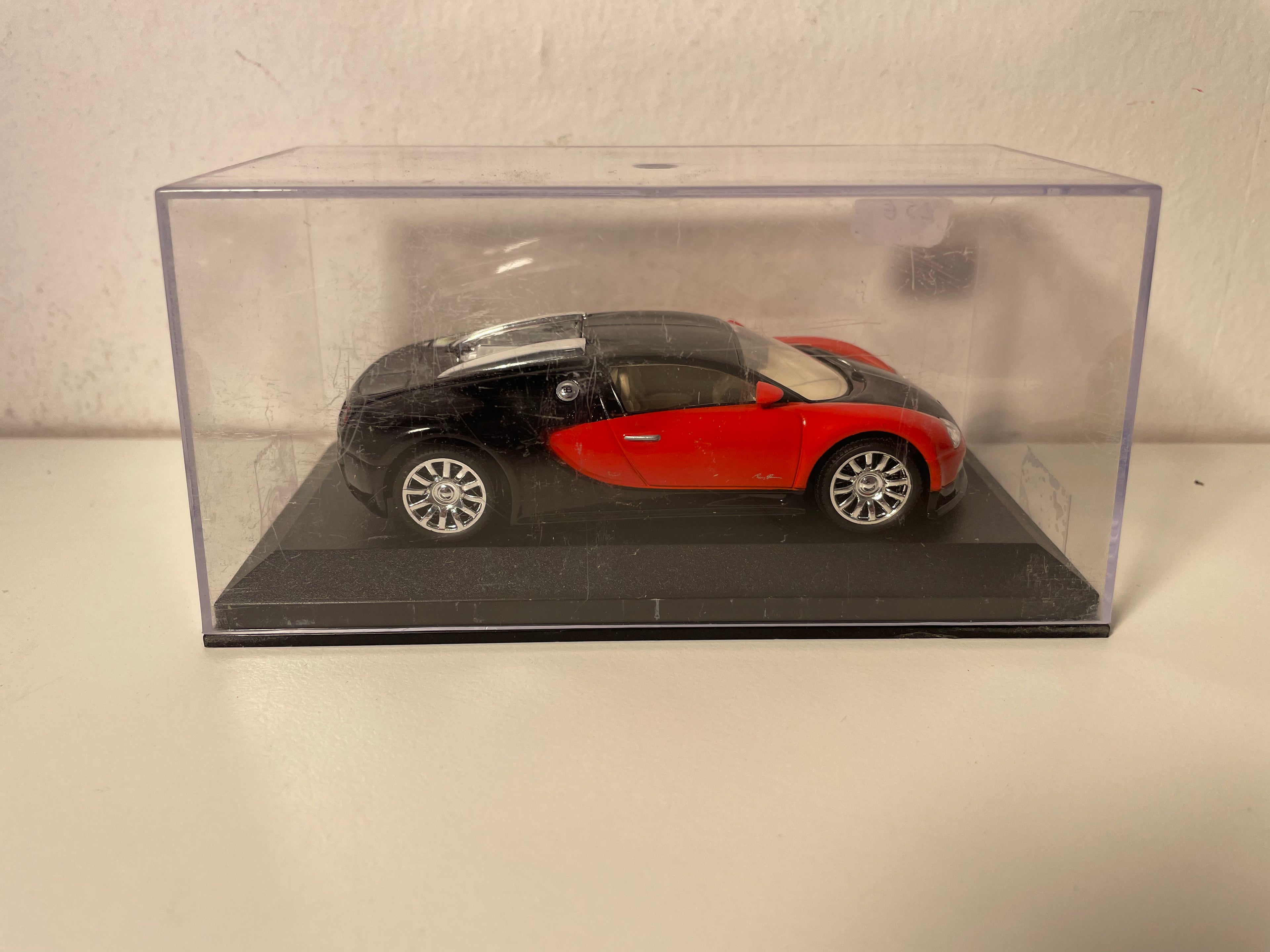 Rout a schwaarz Bugatti Veyron