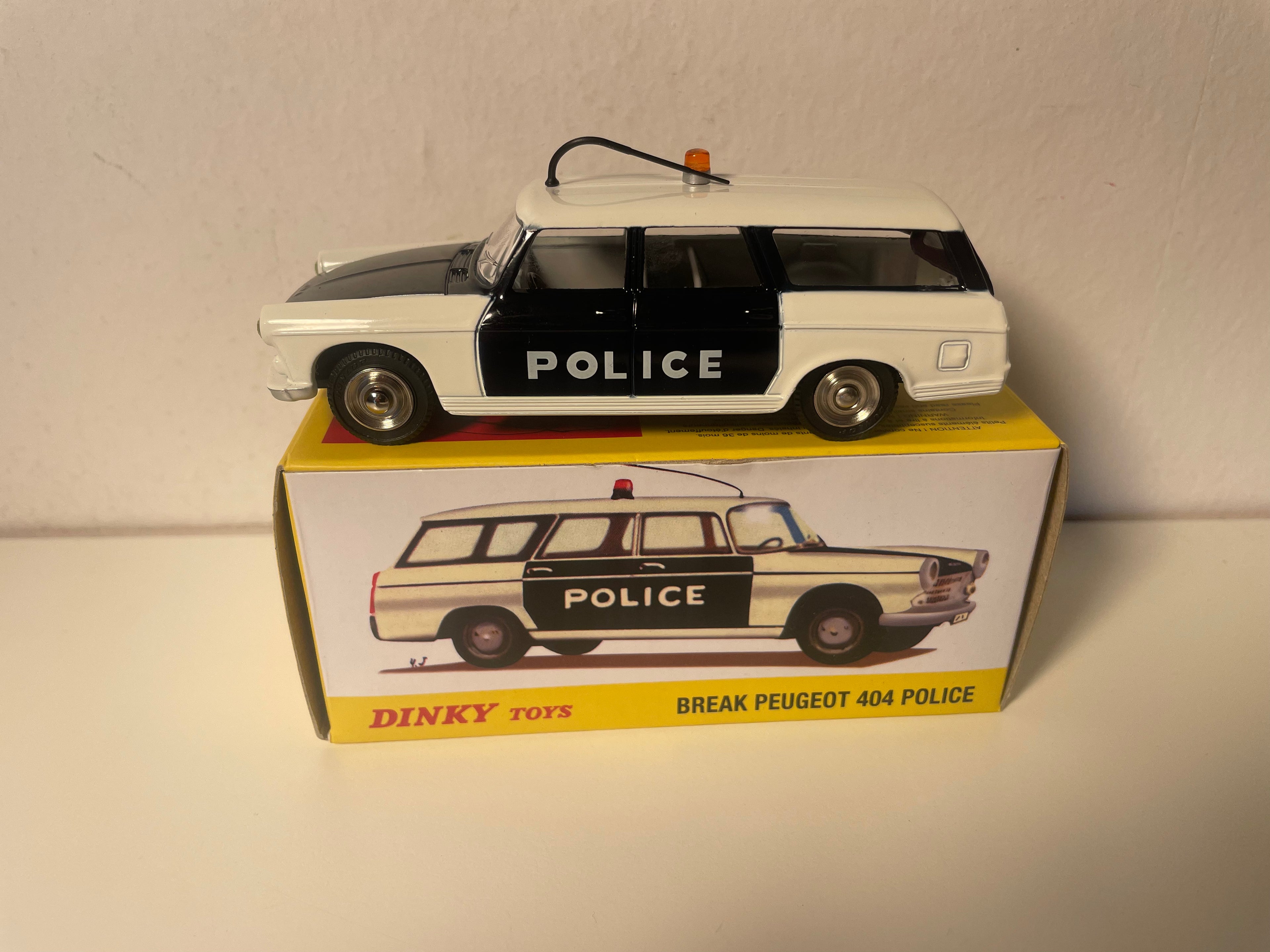 Peugeot 404 break czarno-biała POLICJA Dinky-Toys (wydania Atlas) - Nr 1429