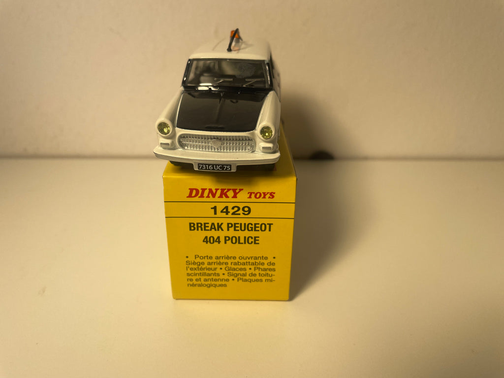 Peugeot 404 break czarno-biała POLICJA Dinky-Toys (wydania Atlas) - Nr 1429