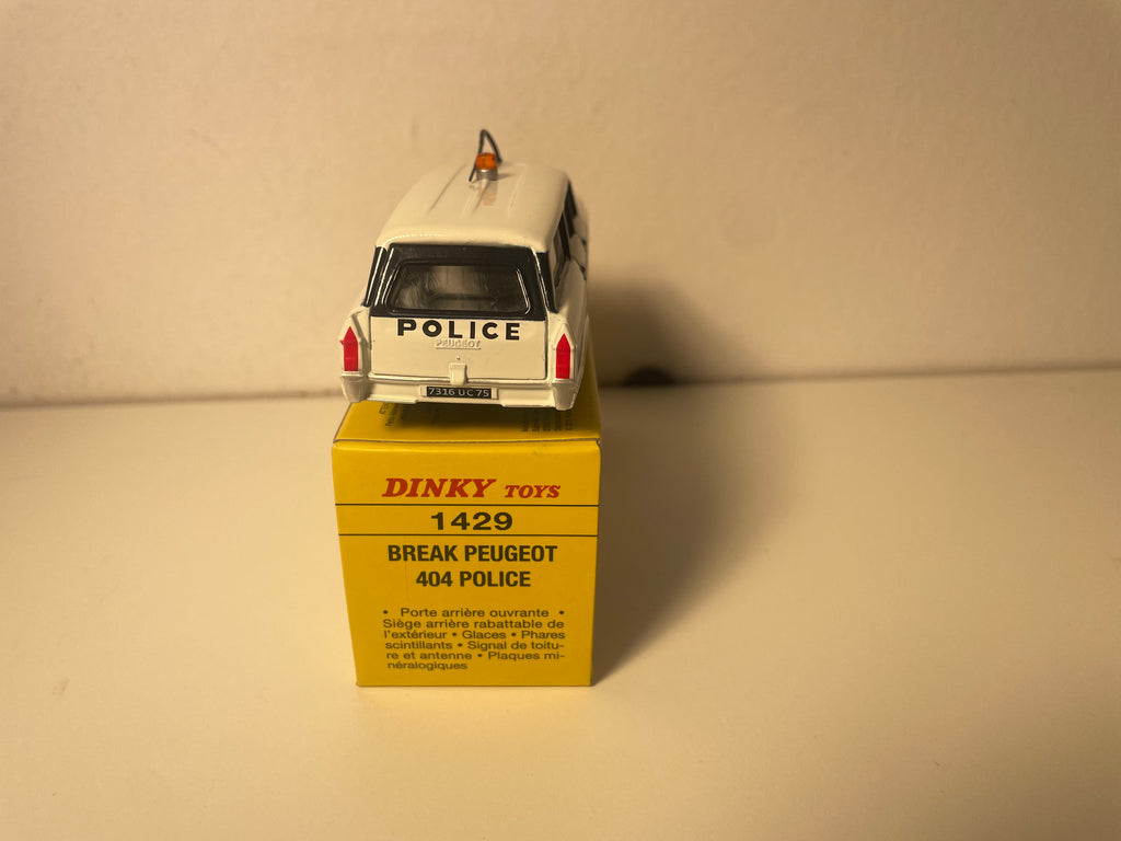 Peugeot 404 break czarno-biała POLICJA Dinky-Toys (wydania Atlas) - Nr 1429