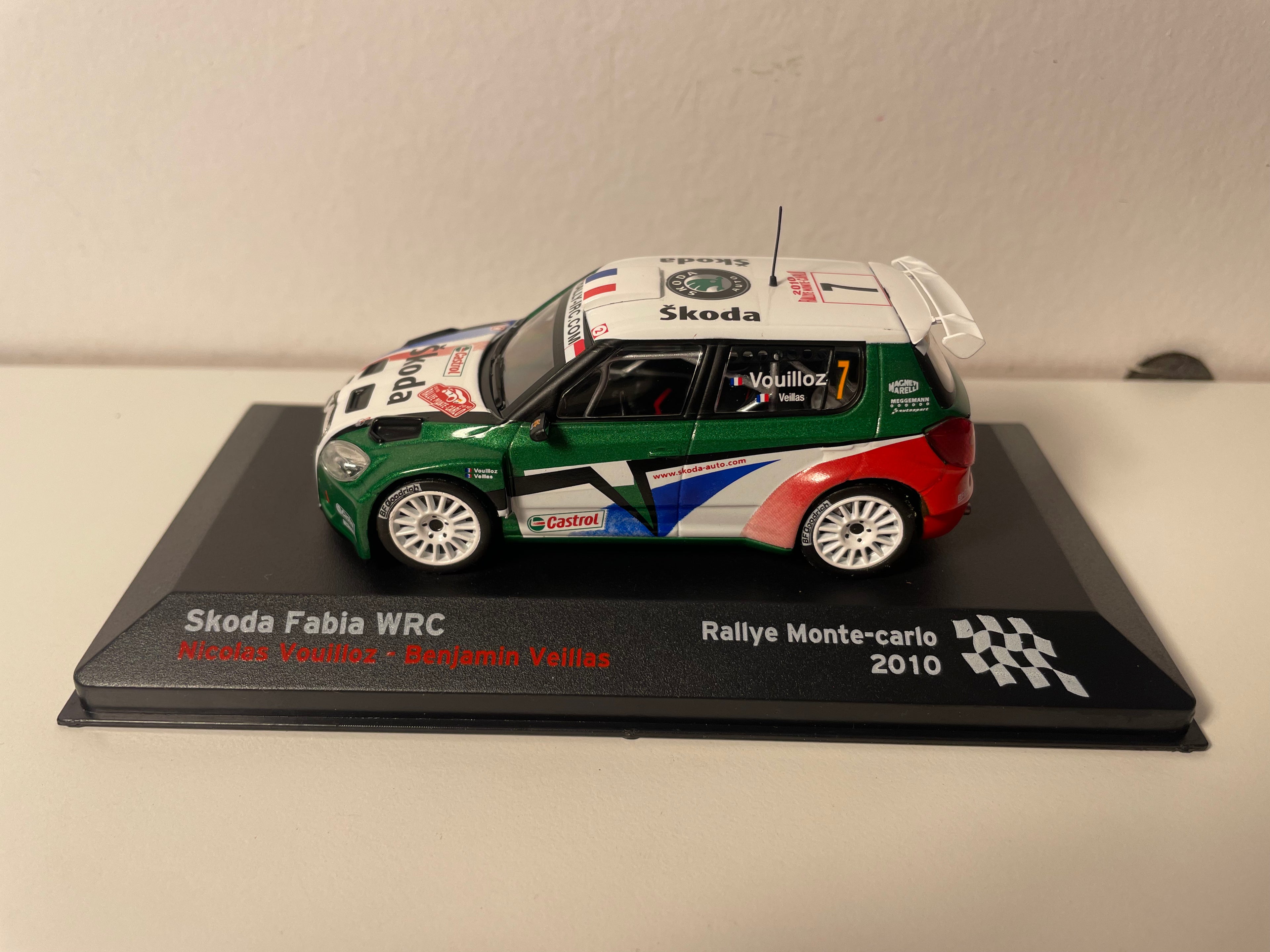 Skoda Fabia WRC white, green, red and blue number 7 - Rally Monte-Carlo 2010