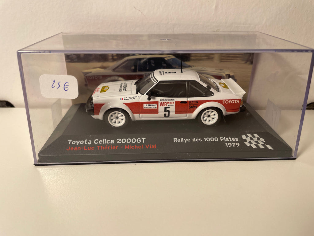 Toyota Célica 2000GT blanca y roja número 5 - rally de 1000 pistas 1979