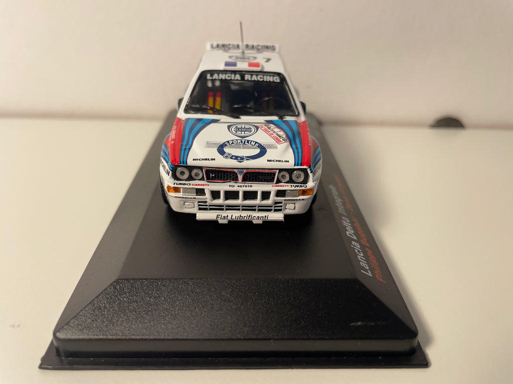 Lancia Delta Integrale biała, czerwona i niebieska numer 7 - Tour de Corse 1992