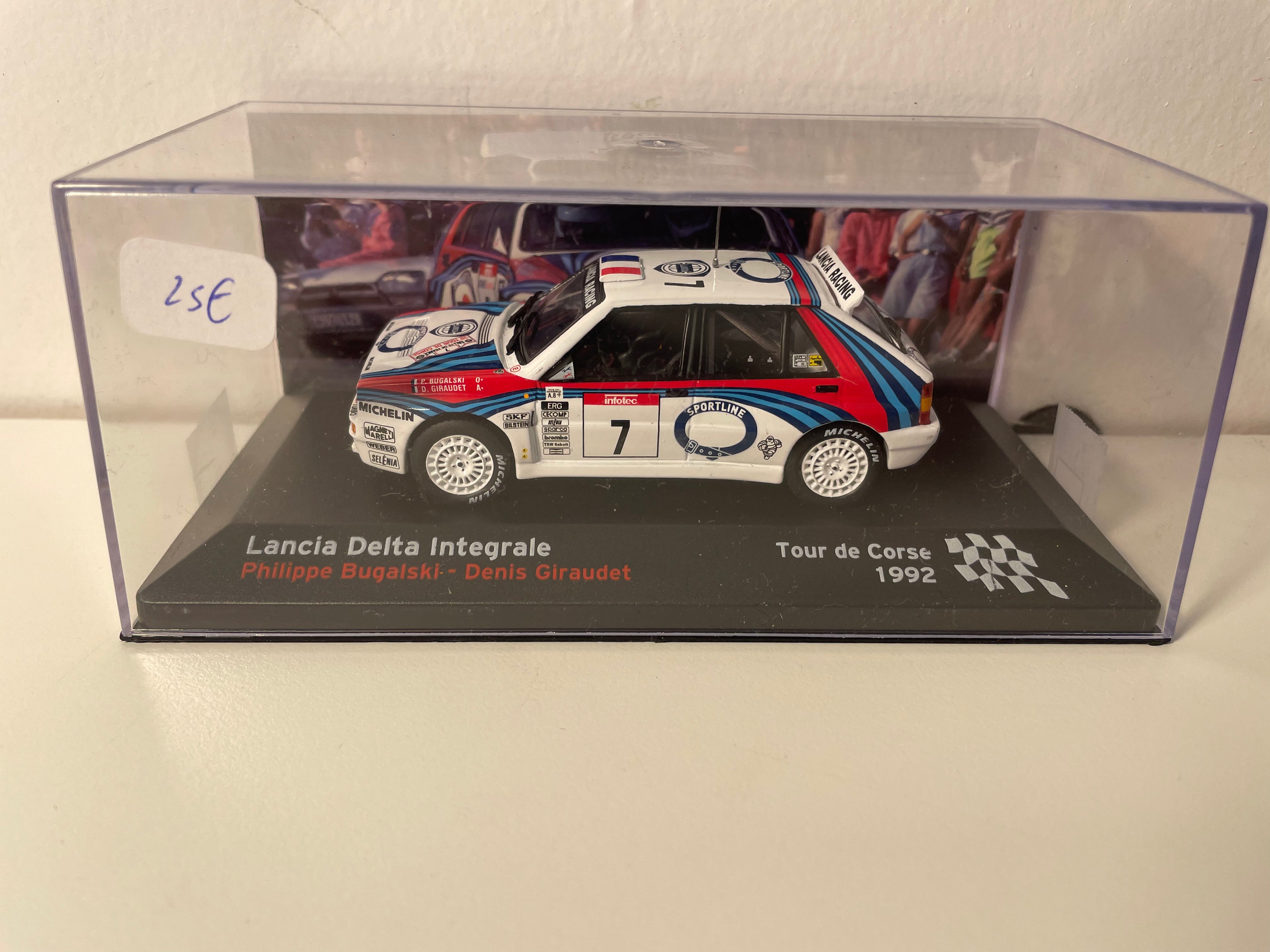 Lancia Delta Integrale biała, czerwona i niebieska numer 7 - Tour de Corse 1992