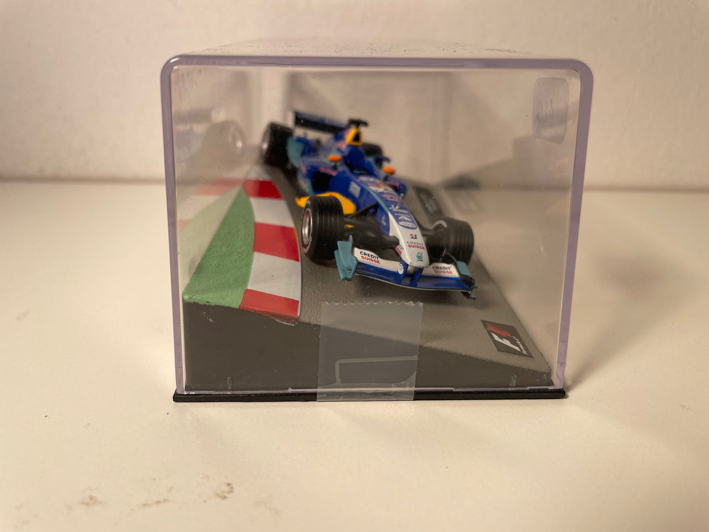 Sauber C23 blo a blo Nummer 12 vum 2004 - Formel 1