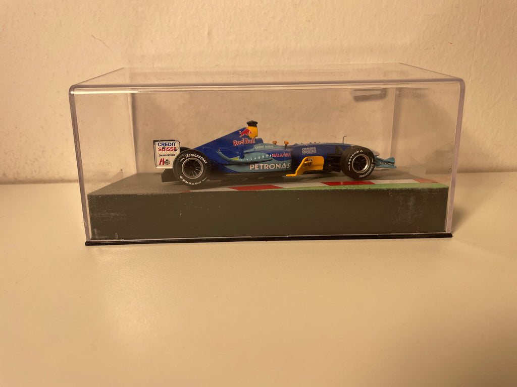 Sauber C23 blo a blo Nummer 12 vum 2004 - Formel 1