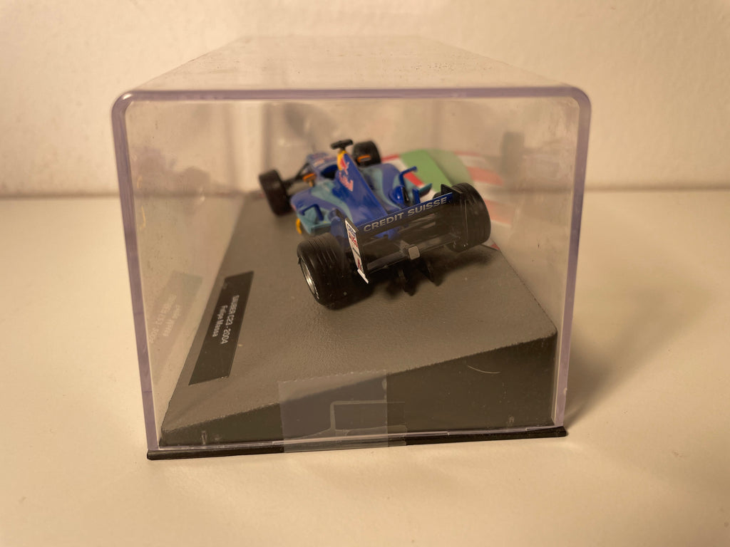 Sauber C23 blo a blo Nummer 12 vum 2004 - Formel 1