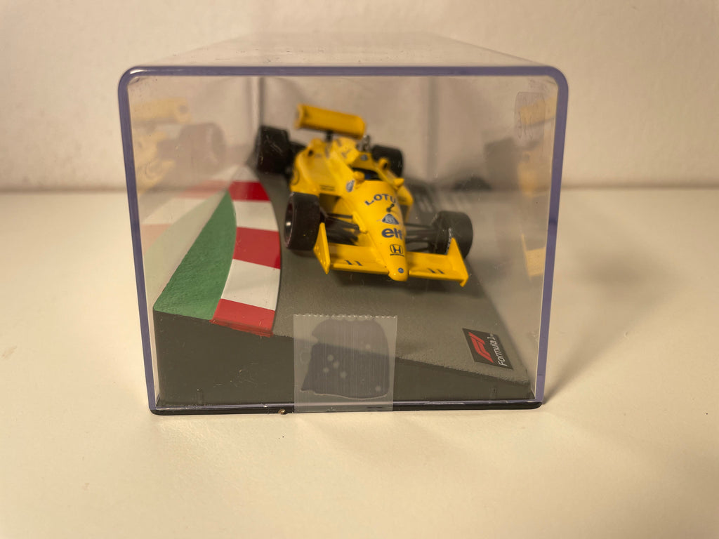 Lotus 99T amarelo número 11 - Fórmula 1 de 1997 (Satoru Nakajima)