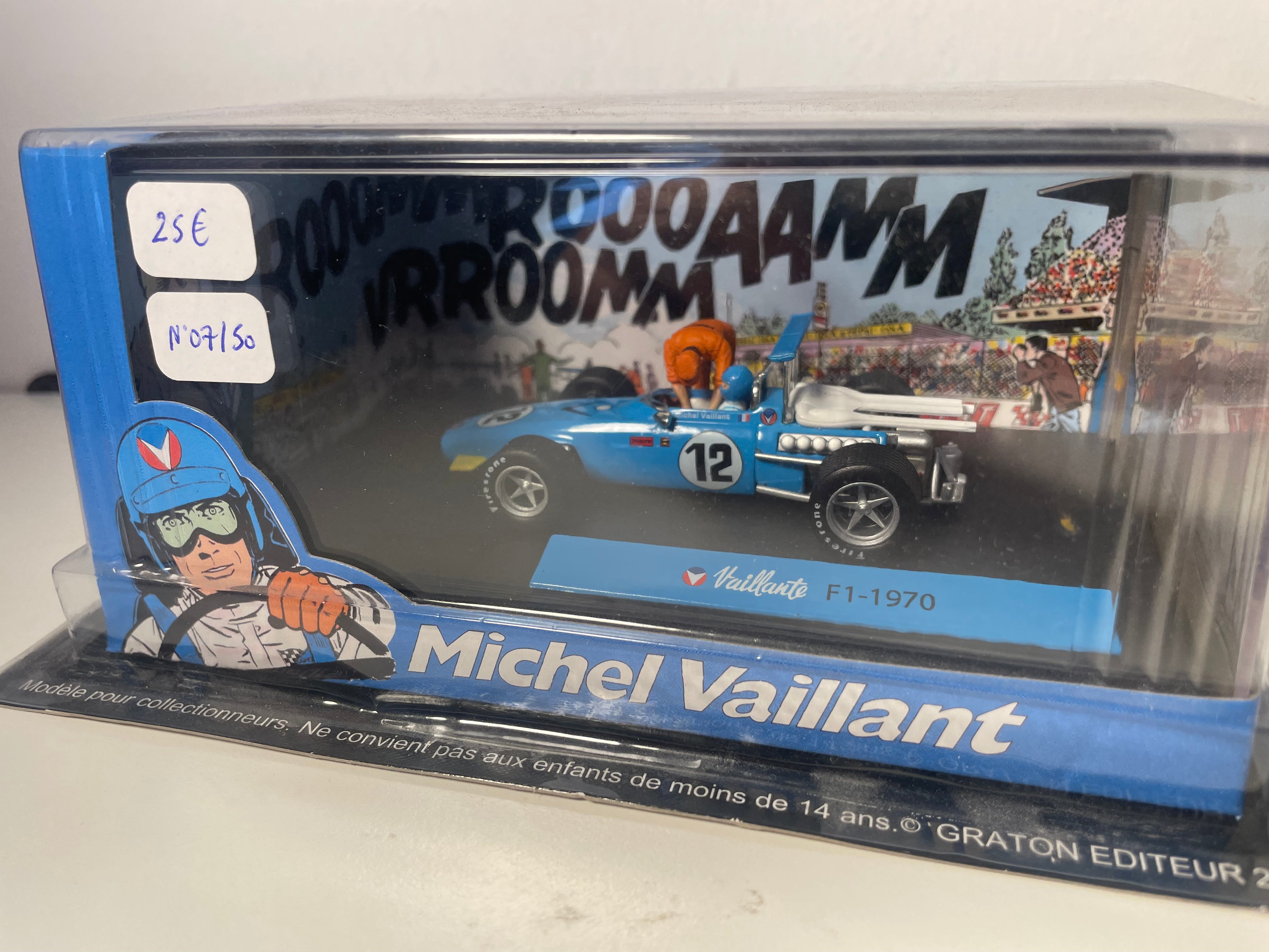 Auto blu numero 12 Vaillante F1-1970 (Album di olio sulla pista) - Fumetto Michel Vaillant