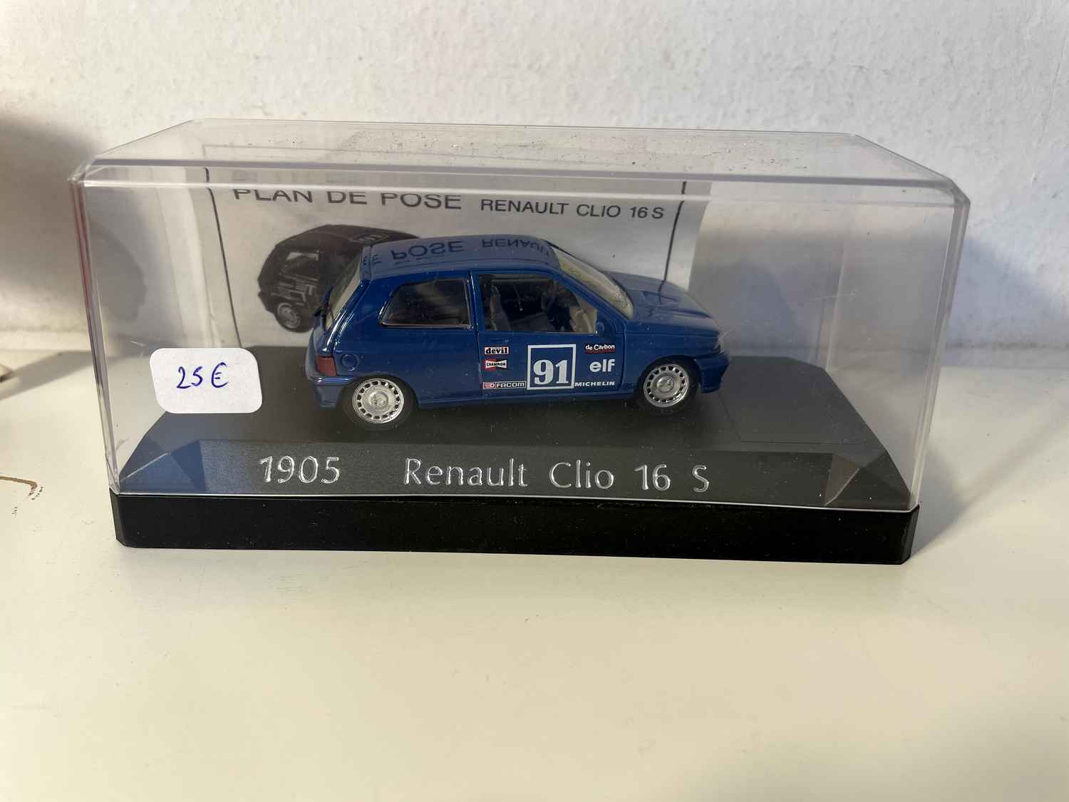 Renault Clio 16S niebieska z numerem 91 (z żółtym pudełkiem) - Solido referencja N°1905