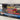 Voiture rouge numéro 13 Leader Le Mans '94 (Album la prisonnière) - Bande Dessinée Michel Vaillant