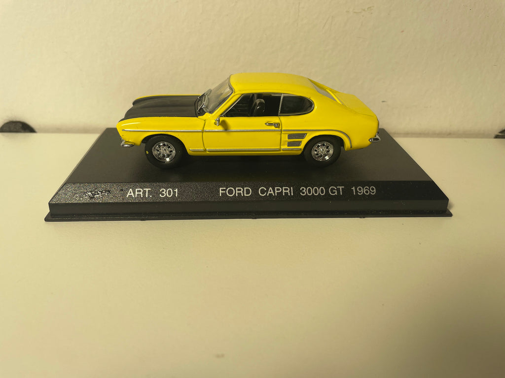 Ford Capri 3000 GT 1969 amarelo e preto (artigo de coleção DetailCars nº 301)